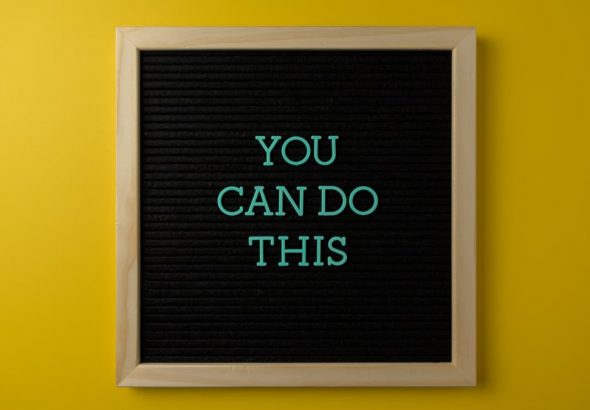 Inspirational message 'You Can Do This' displayed on a blackboard with a bold yellow backdrop.